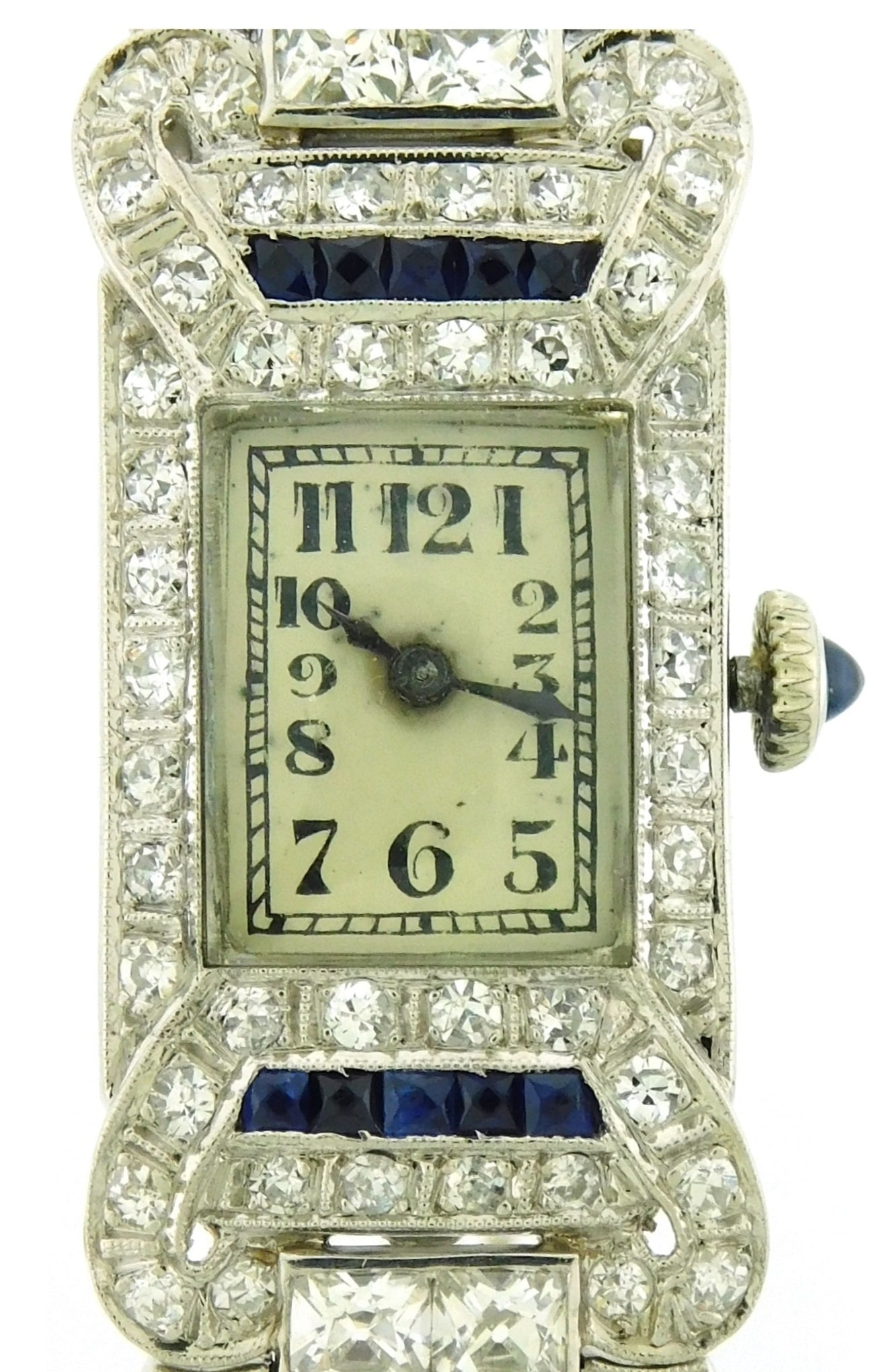 JEWELRY: Art Deco lady’s Longines W. Co. platinum dress watch with diamond bezel and bracelet, and: JEWELRY: Art Deco lady’s Longines W. Co. platinum dress watch with diamond bezel and bracelet, and safety chain, containing a mixture of antique scissor cut, old European cut, and single cut diamond