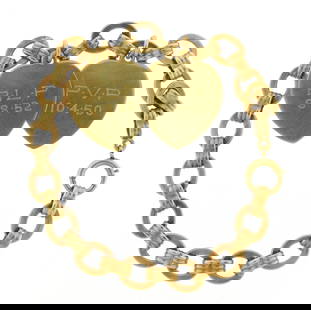 JEWELRY: Heart charm bracelet, 14K and sterling: sterling chain coated in 14K gold, oval link charm: JEWELRY: Heart charm bracelet, 14K and sterling: sterling chain coated in 14K gold, oval link charm bracelet with spring ring clasp, stamped both sterling and 14k, 7" l., containing two charms: 14K ye