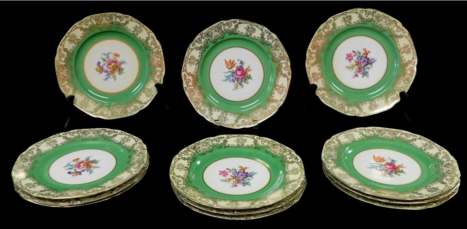 Twelve Tirschenreuth dinner plates, Bavarian, mid-late 20th C., transferred floral center on white (1 of 3)