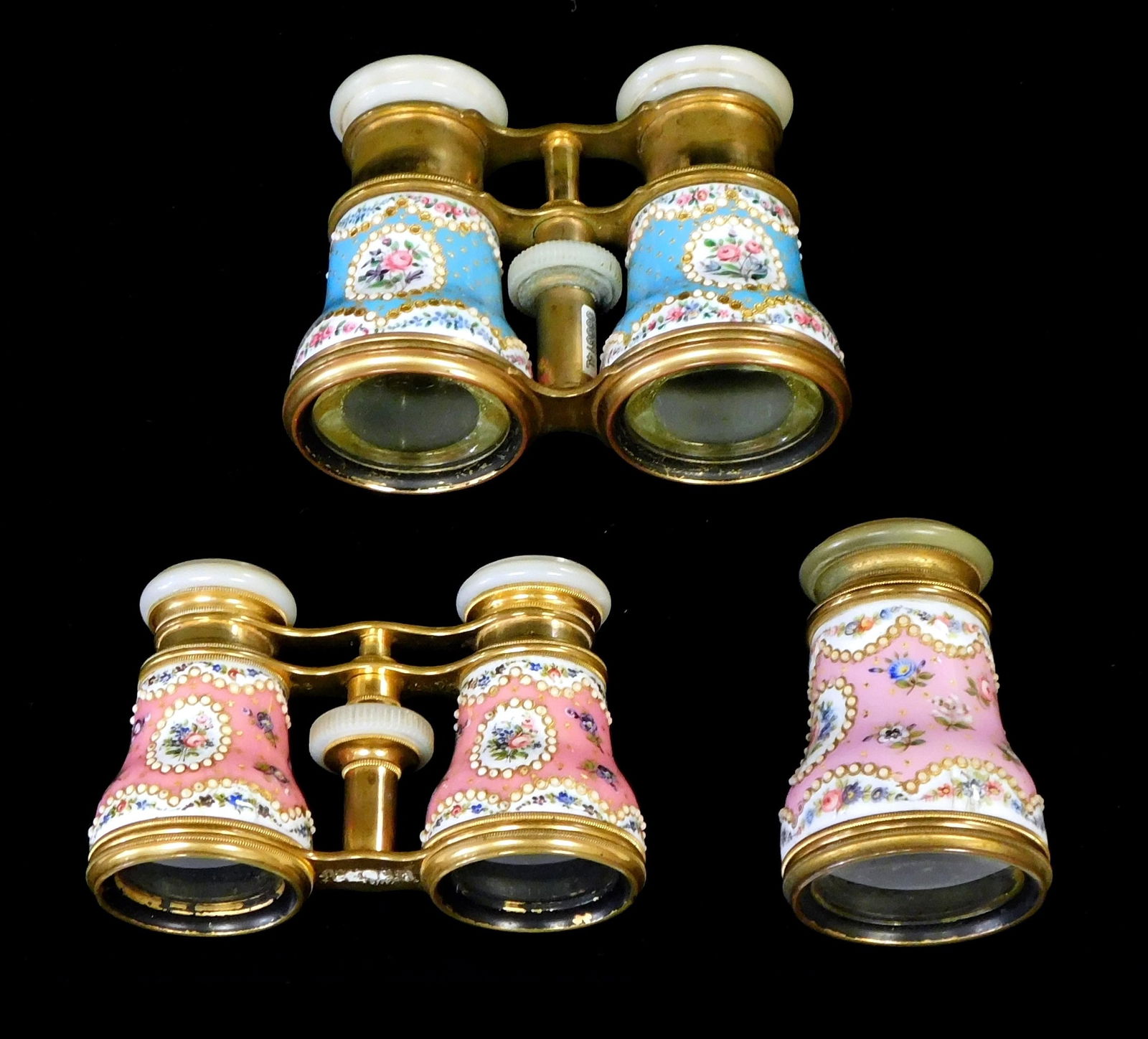 Three enamel opera glasses, late 19th C., all three with hand painted floral and golden enamel, (1 of 7)
