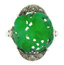 JEWELRY: Edwardian jade and diamond ring, tested platinum, milgrain with hand engraved details,