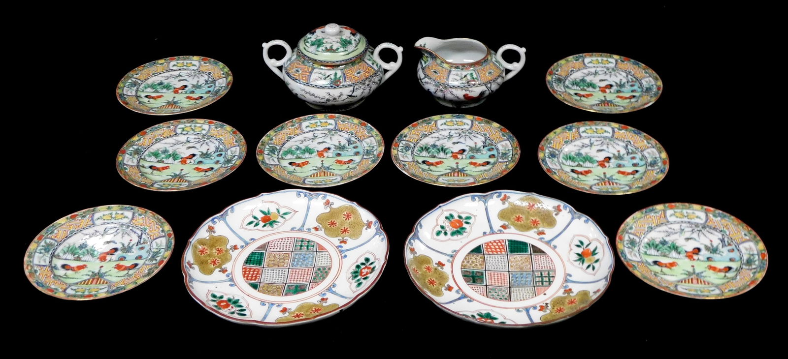 ASIAN: Japanese and Chinese porcelain, twelve pieces, including: pair of Japanese polychrome export: ASIAN: Japanese and Chinese porcelain, twelve pieces, including: pair of Japanese polychrome export dishes, each with hand painted floral and mosaic patterns, wear consistent with age and use, includi