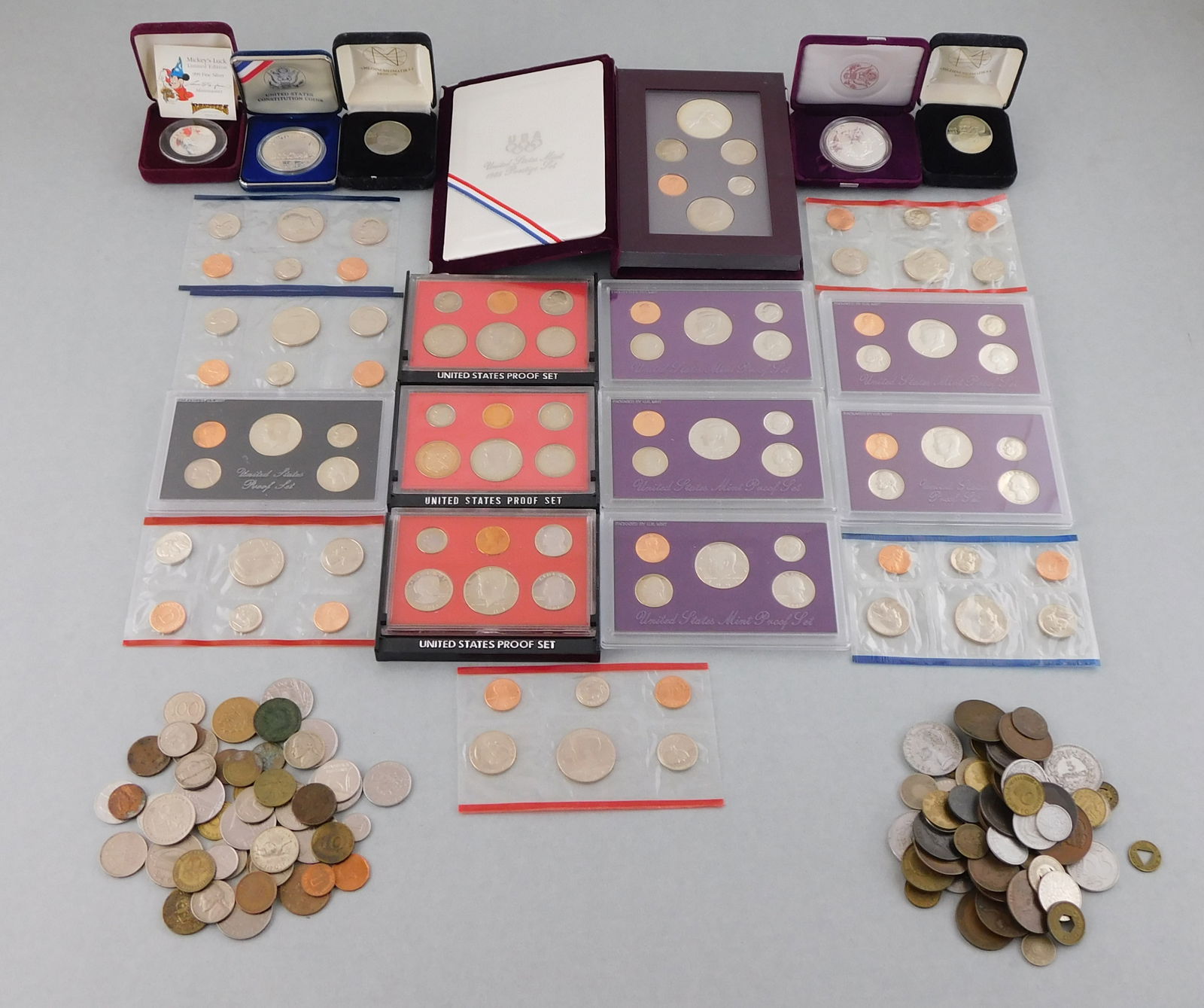 COINS: Collection of US and world coins, consisting of both circulated and commemorative coins, (1 of 5)