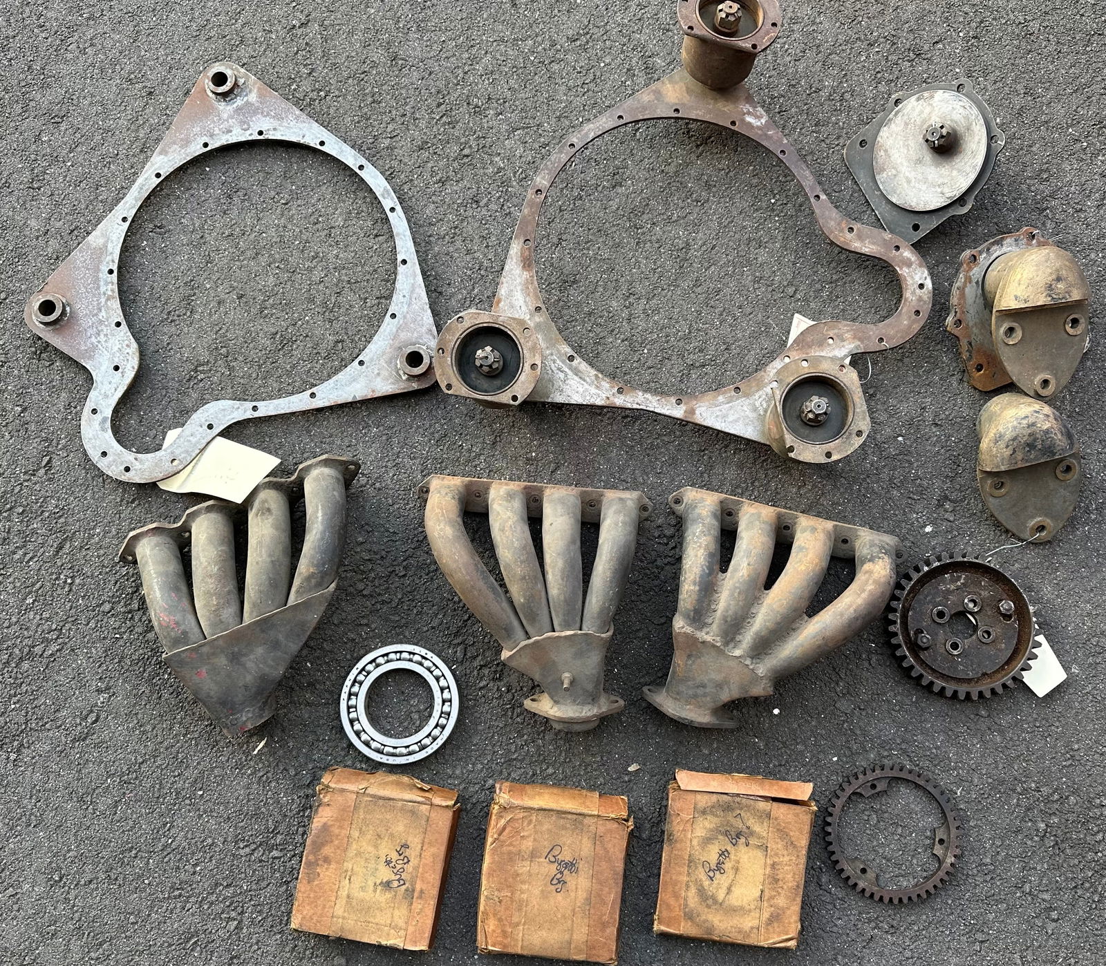 Misc Bugatti parts, Type 57 engine mounts, Type 44-49 exhaust manifolds, eight cylinder NOS ball (1 of 4)