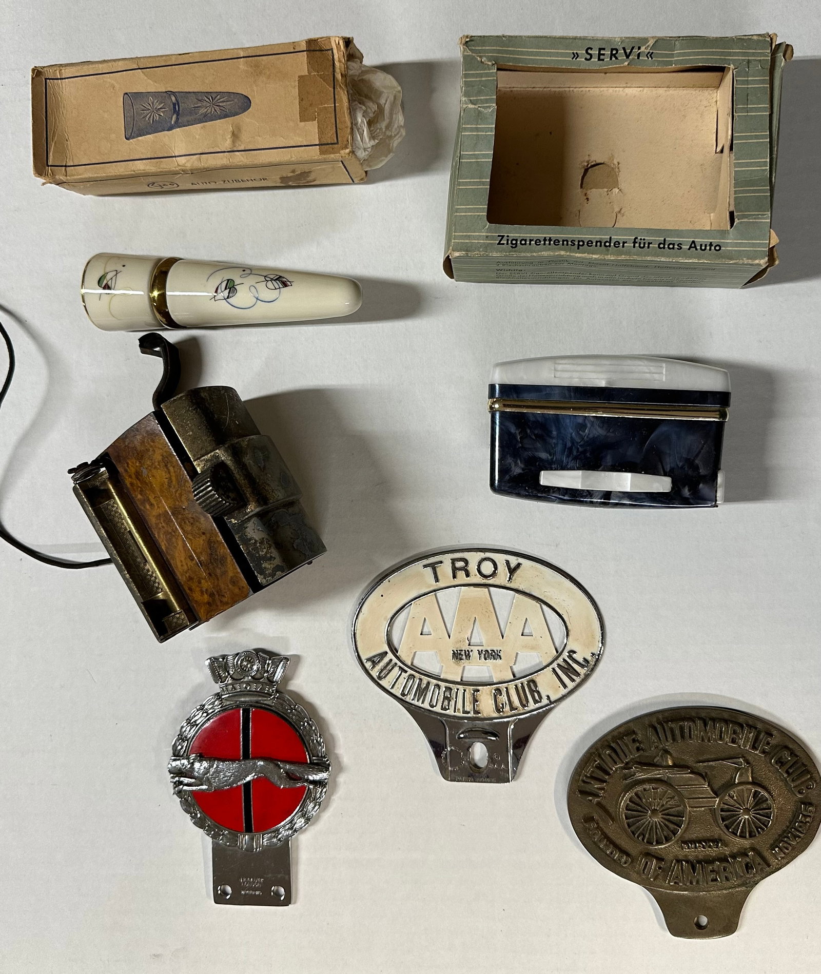 West German mfg cigarette dispenser and bud vase (unique1950’s Porsche or VW accessories),: West German mfg cigarette dispenser and bud vase (unique1950’s Porsche or VW accessories), Masterbilt US cigarette dispenser / lighter, three auto club badges, gd to vg condition [NOTE: SHIPPING