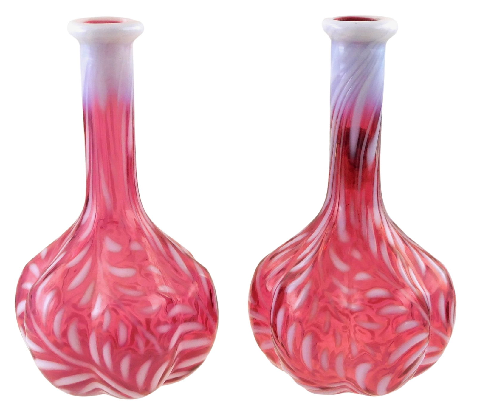 Pair of 20th C. pink opalescent barber bottles, blown pink glass with white fern designs, and white (1 of 2)