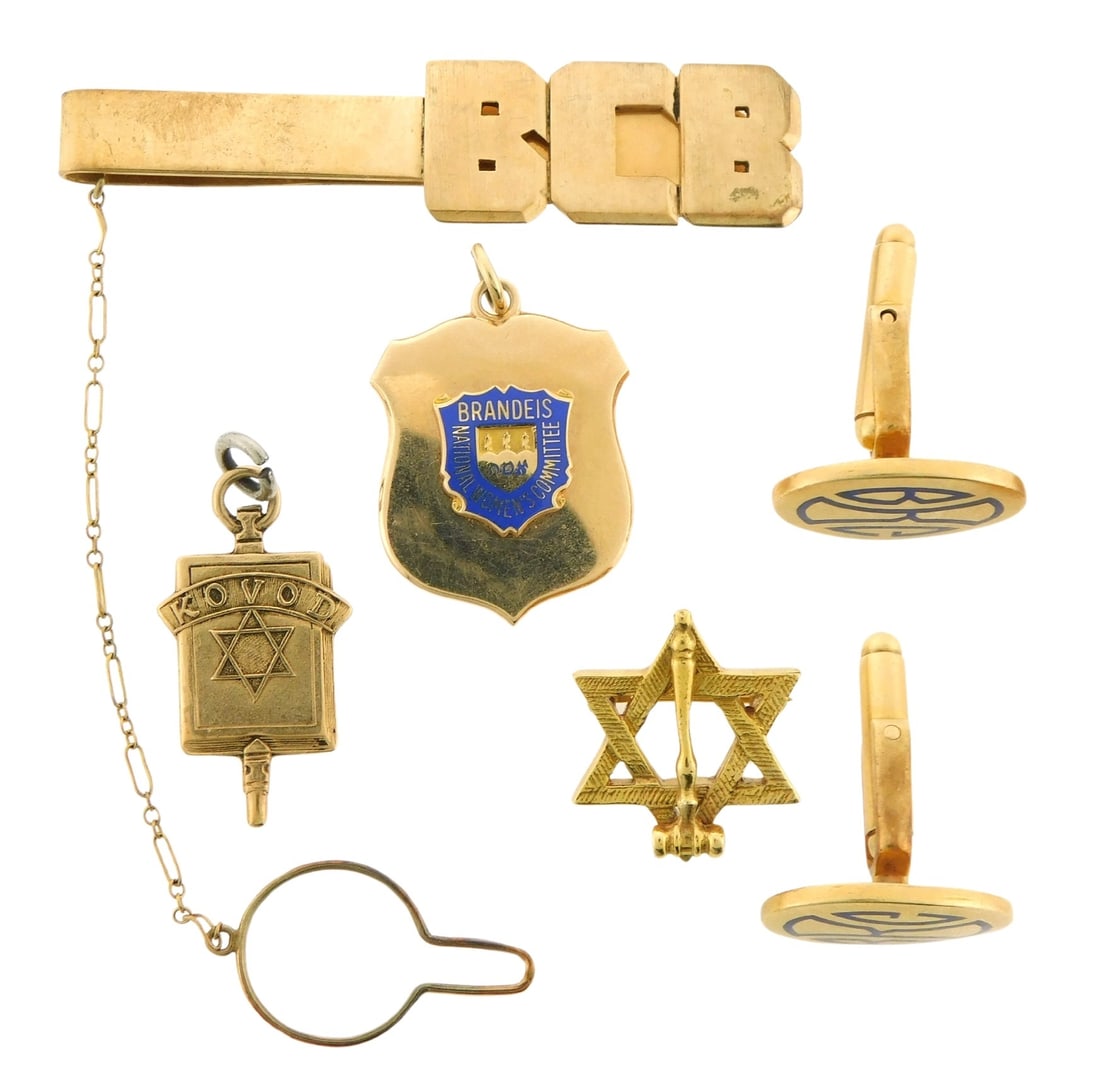 JEWELRY: Gold items, including: stamped and tested 10K yellow gold shield pendant, center has a blue (1 of 5)