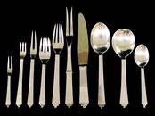 STERLING: Georg Jensen "Pyramid" sterling flatware, forty-nine pieces total, including: eight