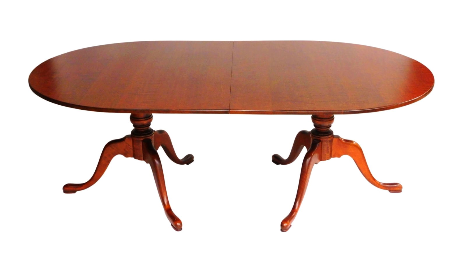 +Eldred Wheeler tiger maple tilt-top dining table, Hanover, Massachusetts, 20th C., bench made in th: +Eldred Wheeler tiger maple tilt-top dining table, Hanover, Massachusetts, 20th C., bench made in the Queen Anne style, supported by double pedestal tripod base with pad feet, two insert leaves, pads
