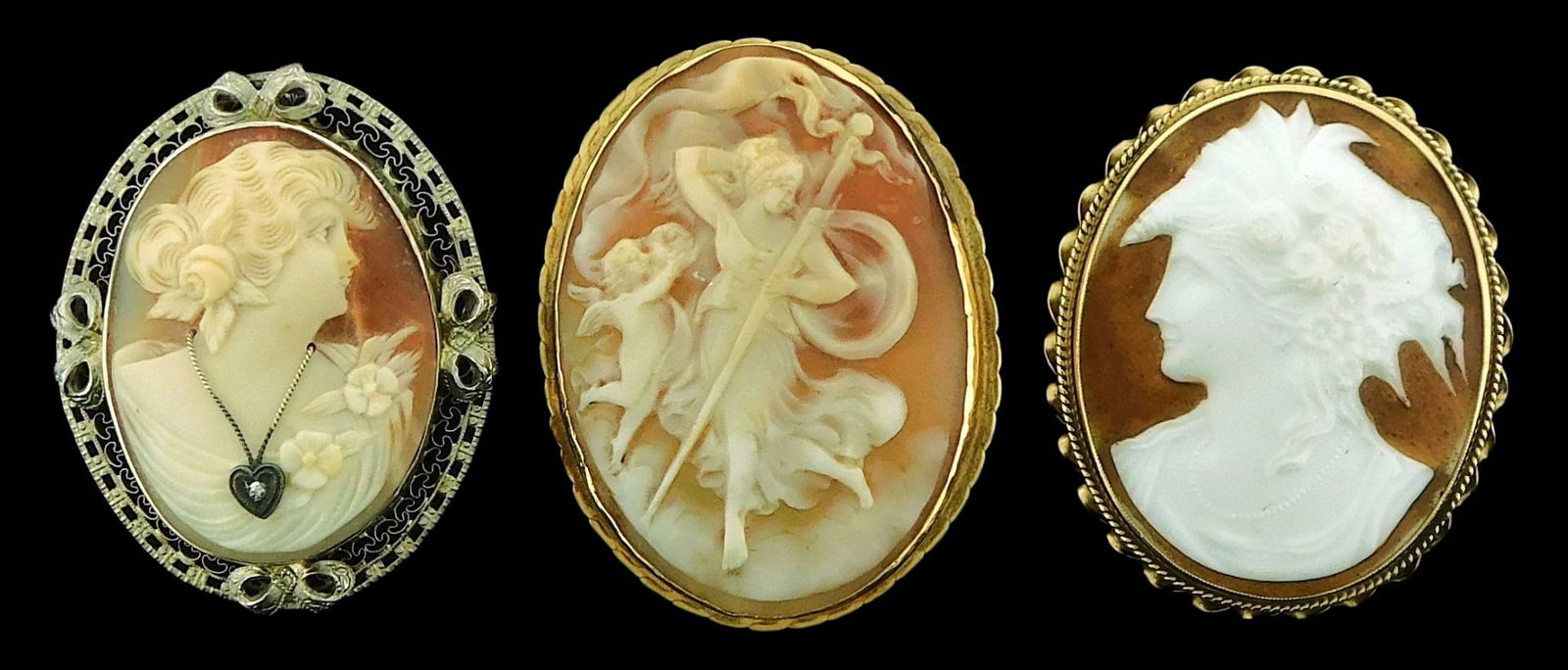 JEWELRY: Three Antique cameo brooches, each in marked 14K gold settings, including: carved shell cam (1 of 5)
