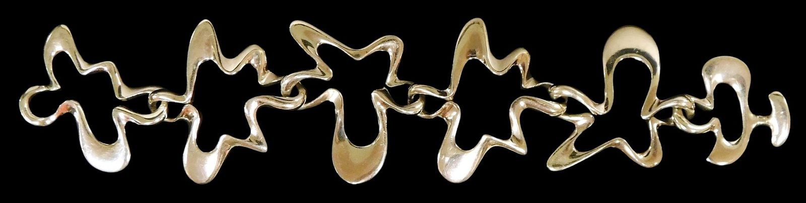 JEWELRY: Sterling Georg Jensen "Splash" bracelet designed by Henning Koppel, post 1945, Danish (1 of 3)