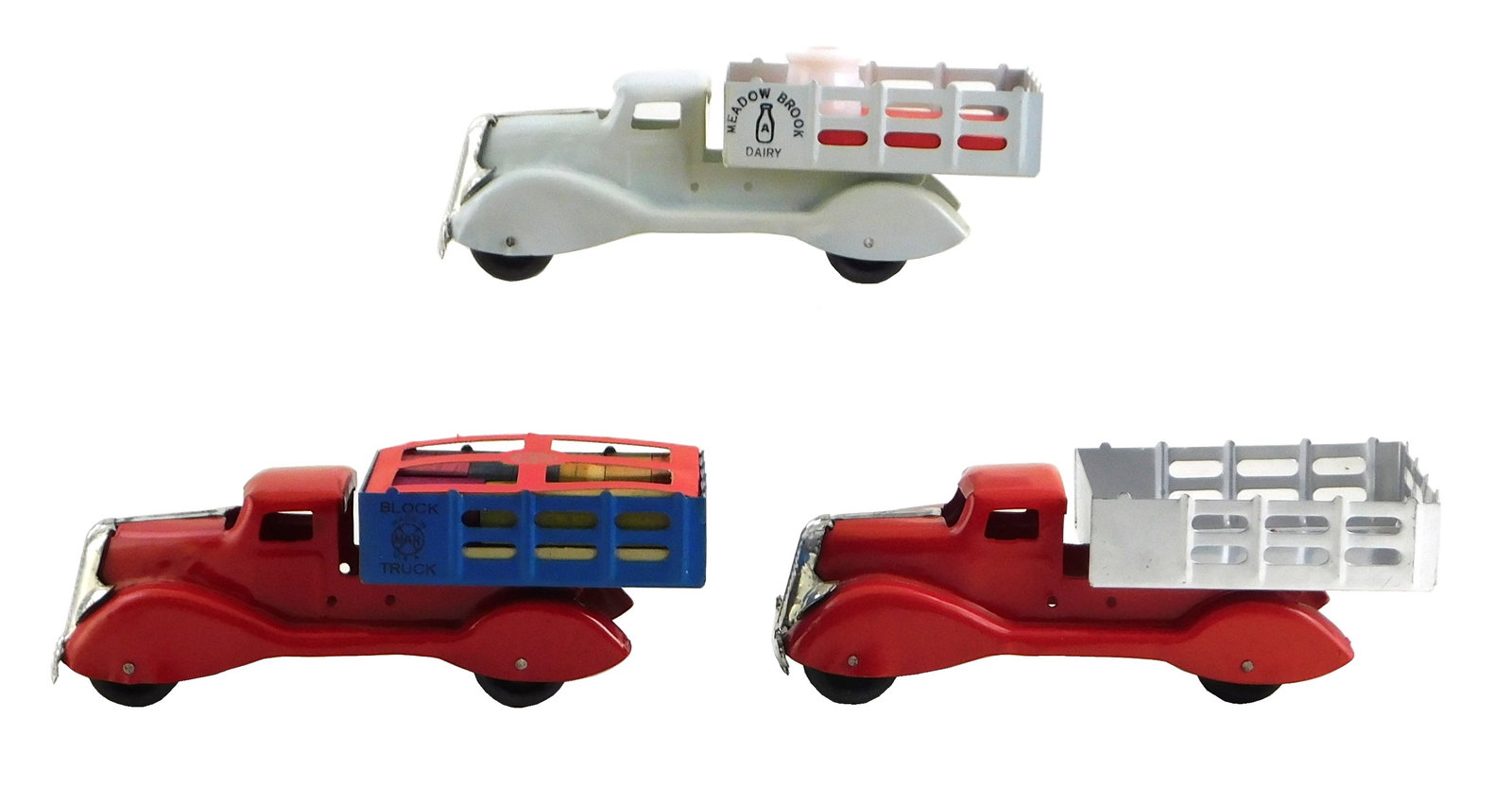 TOYS: Three Marx toy trucks, mid-20th C., some with original accessories and cardboard, including: (1 of 5)