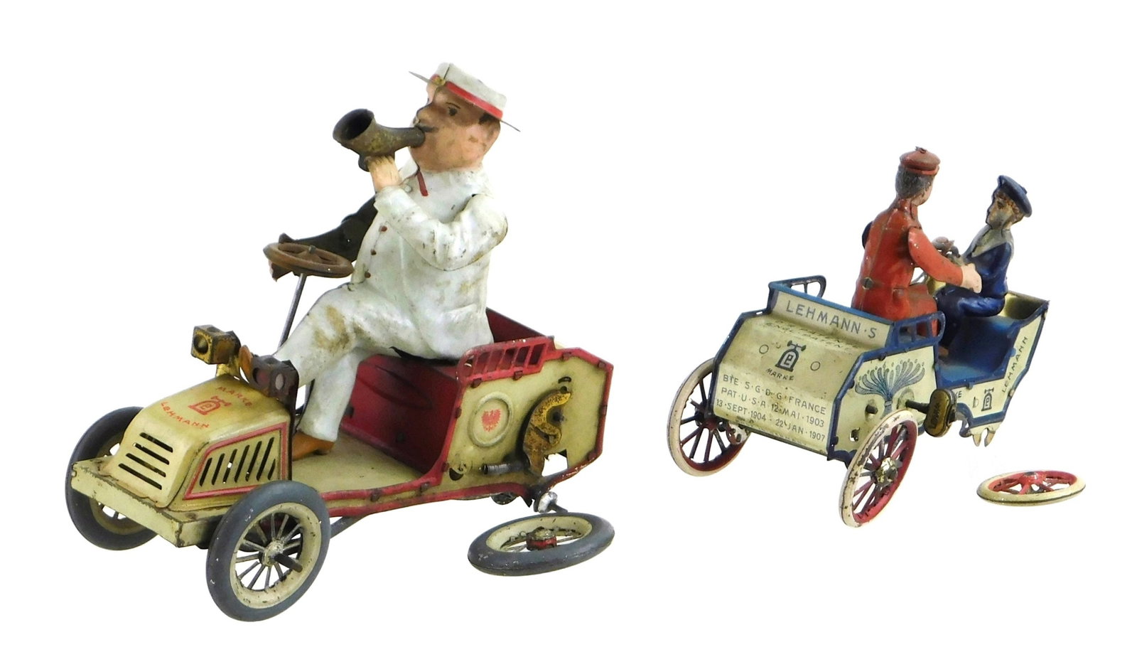 TOYS: Two Lehmann's key wound mechanical cars, early 20th C., each with lithograph decoration,: TOYS: Two Lehmann's key wound mechanical cars, early 20th C., each with lithograph decoration, including: "Tut Tut", mechanical car with man in white suit and hat blowing a horn, bellows for horn nois