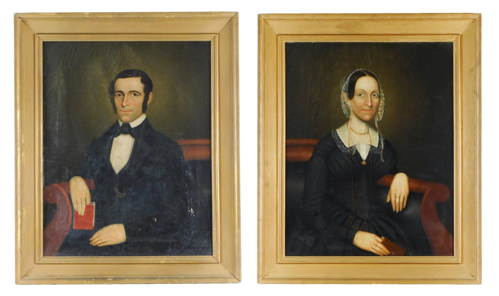 Pair of early 19th C. American school portraits, oil on canvas, seated couple, including a man with: Pair of early 19th C. American school portraits, oil on canvas, seated couple, including a man with book, and a woman with sheer bonnet, each with Edward Dechaux of New York canvas stamps verso, match