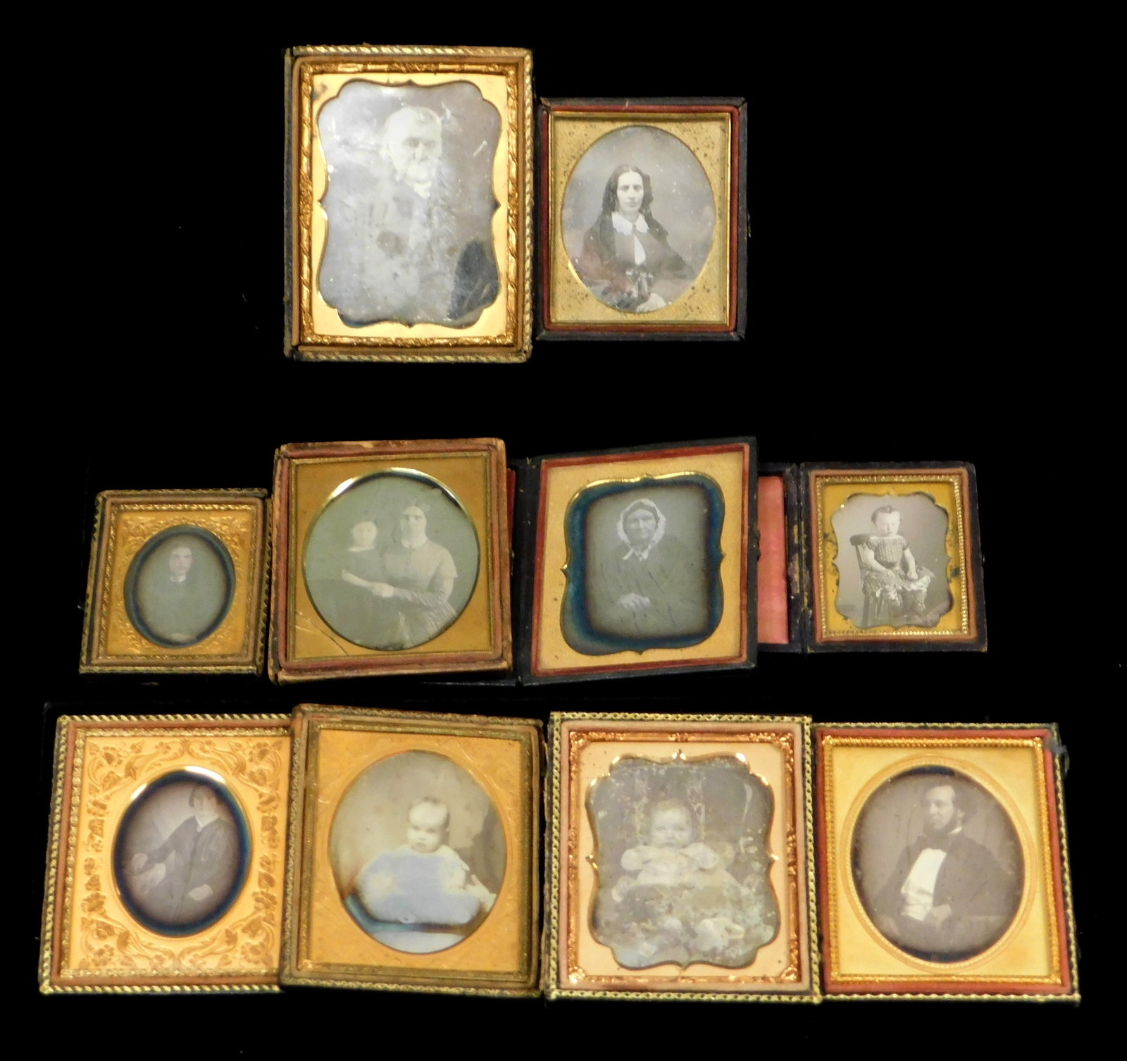 EARLY PHOTOGRAPHY: Ten Daguerreotypes of men, women, and children of different ages and attire,: EARLY PHOTOGRAPHY: Ten Daguerreotypes of men, women, and children of different ages and attire, highlights include: two of babies, possibly memento mori; large portrait of an older gentleman; photogra