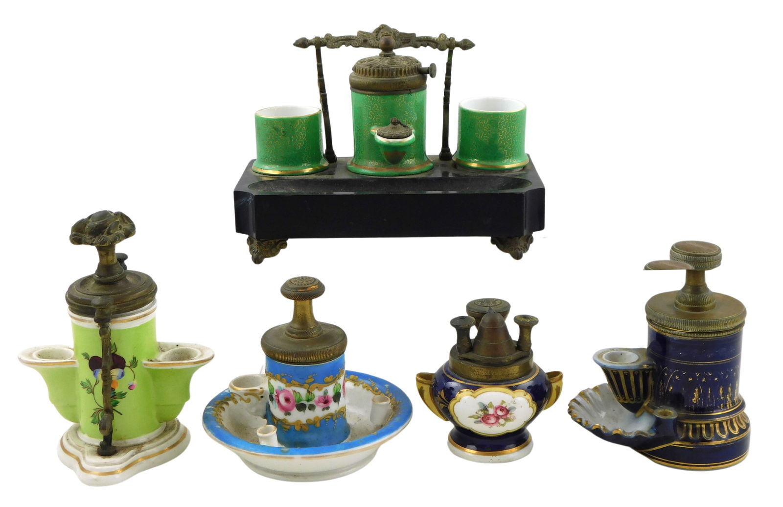 Five 19th C. pump inkwells, including: inkstand with central pump inkwell, and open inkwells to: Five 19th C. pump inkwells, including: inkstand with central pump inkwell, and open inkwells to either side, all made from opal glass decorated with green and gilt designs, inkstand with handle/pen ho
