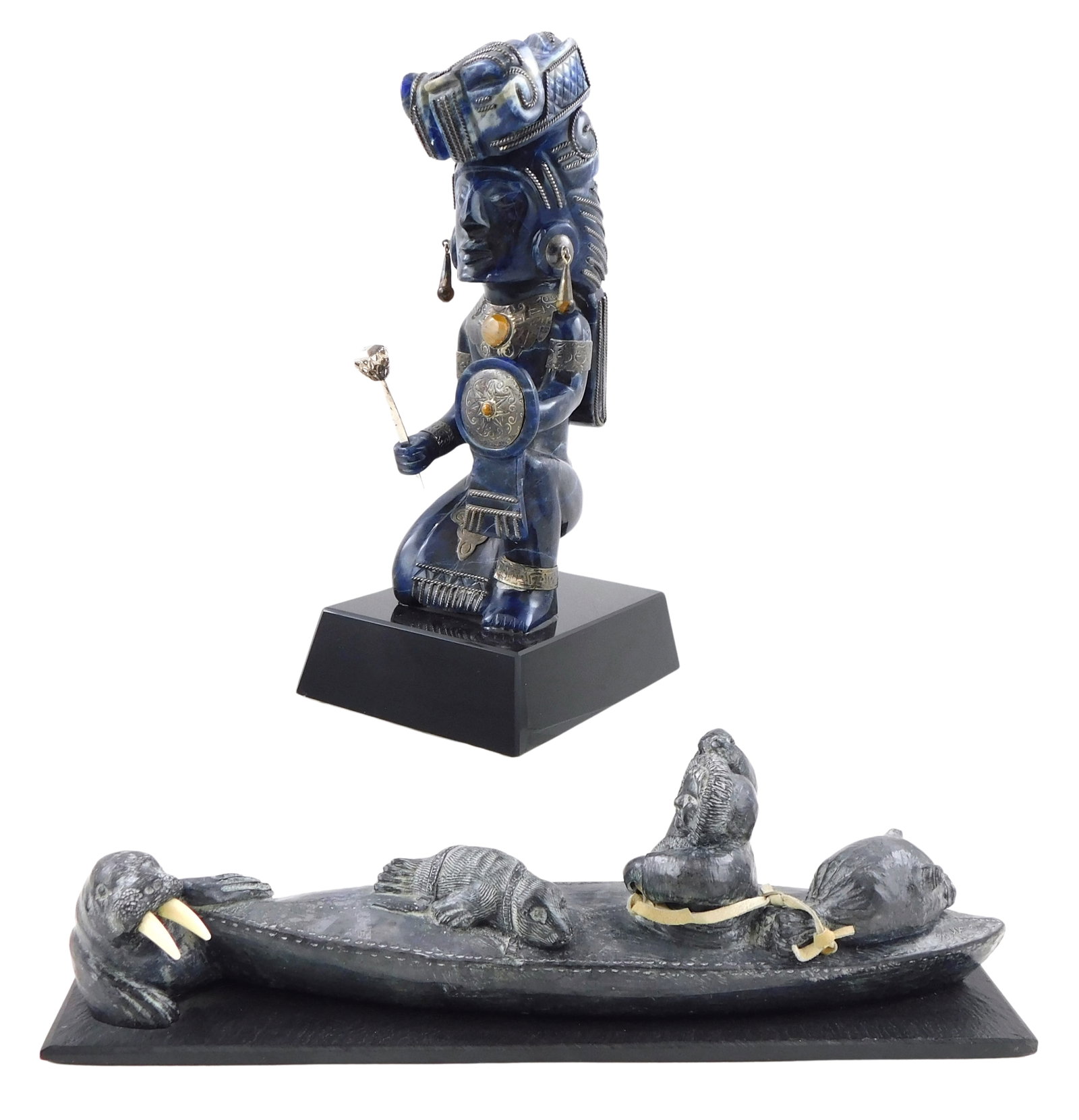 SCULPTURE: Two stone sculptures, 20th C., the first a keeling figure, deep navy blue hardstone with: SCULPTURE: Two stone sculptures, 20th C., the first a keeling figure, deep navy blue hardstone with added silver accents throughout, figure with large headdress and chest plate with cabochon, 10 &frac