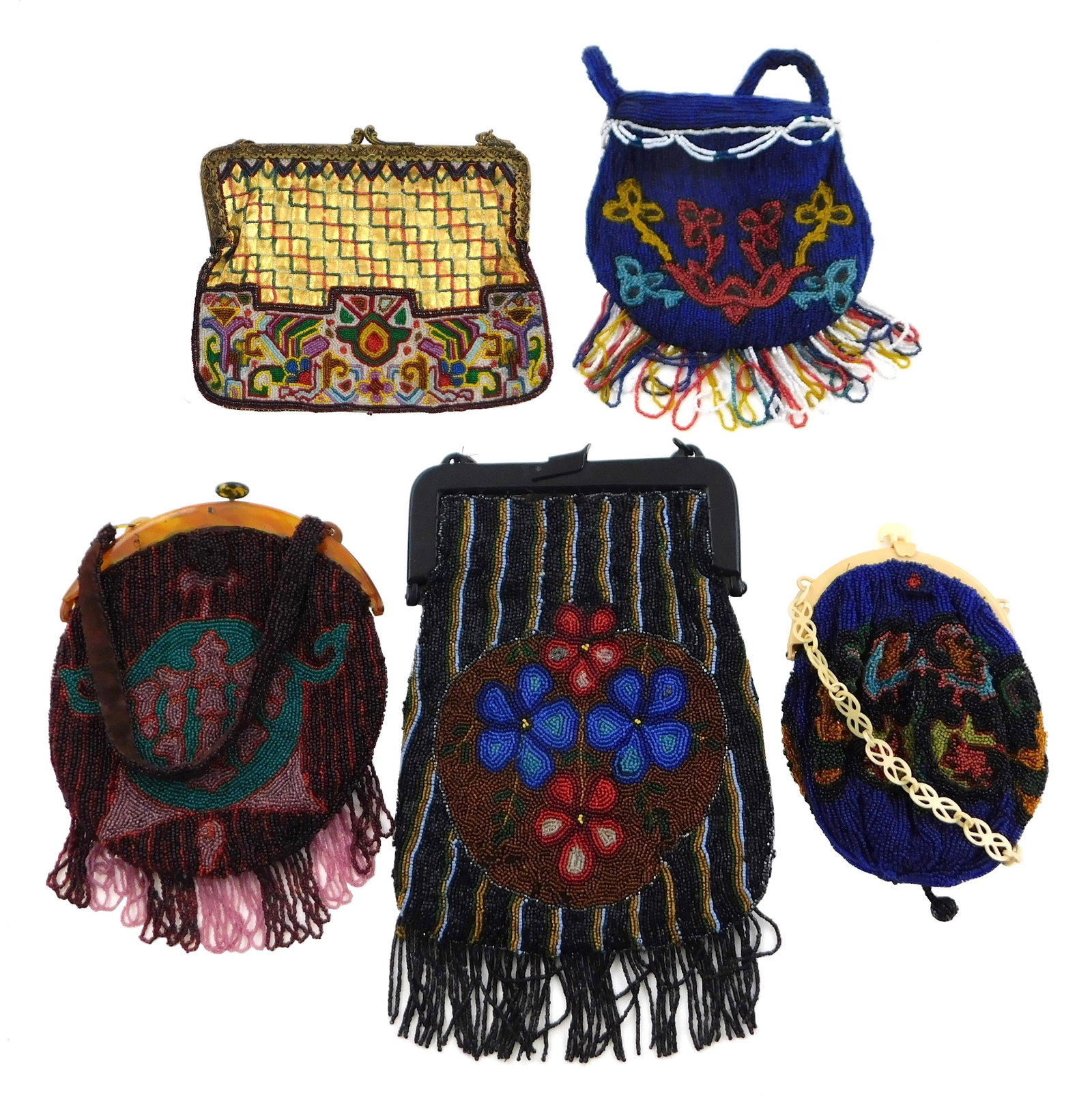 Five vintage beadwork purses, early to mid 20th C., four marked "Made in France", three with early: Five vintage beadwork purses, early to mid 20th C., four marked "Made in France", three with early plastic parts resembling Bakelite or celluloid, each with elaborate beadwork designs and lined with l