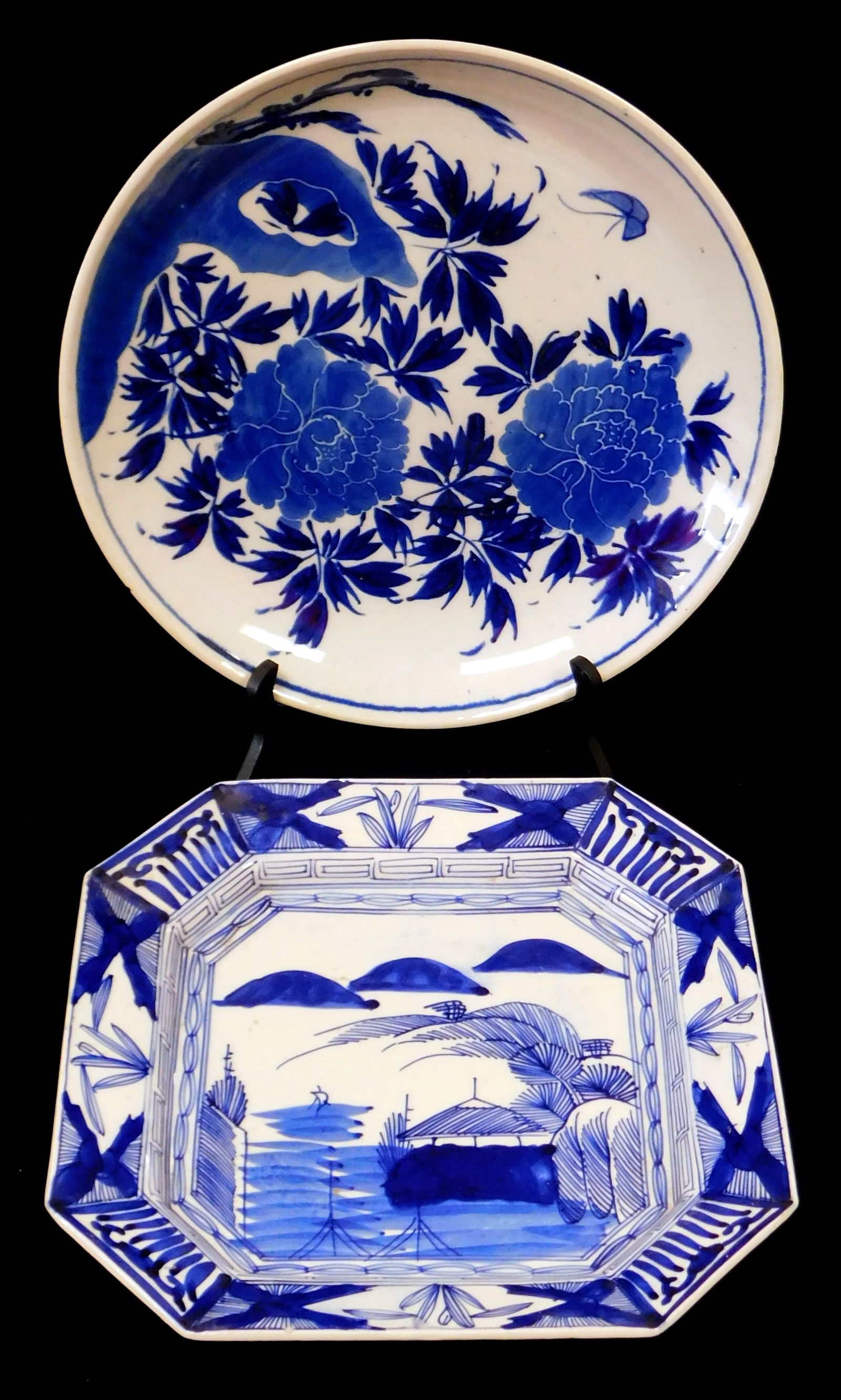 ASIAN: Two Asian chargers with dark cobalt decoration, including: Japanese blue and white square: ASIAN: Two Asian chargers with dark cobalt decoration, including: Japanese blue and white square charger, with cut corners, simplistic decoration including landscape with hills or clouds in distance,