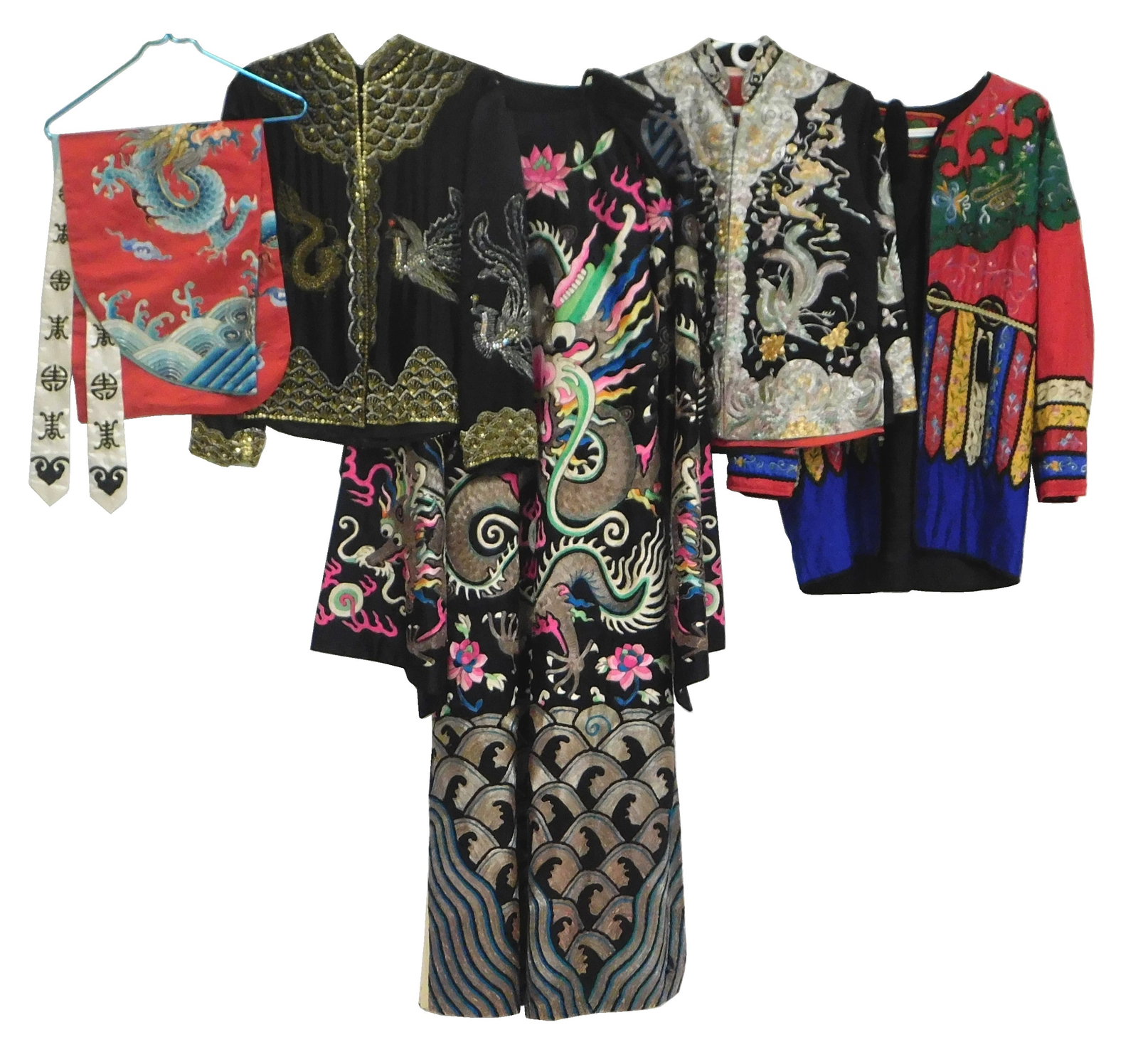 ASIAN: Five pieces of Chinese and other garments, 20th C., the first a black kimono with colorful: ASIAN: Five pieces of Chinese and other garments, 20th C., the first a black kimono with colorful dragon design featuring metallic threads with wave motif and floral design throughout, label at collar