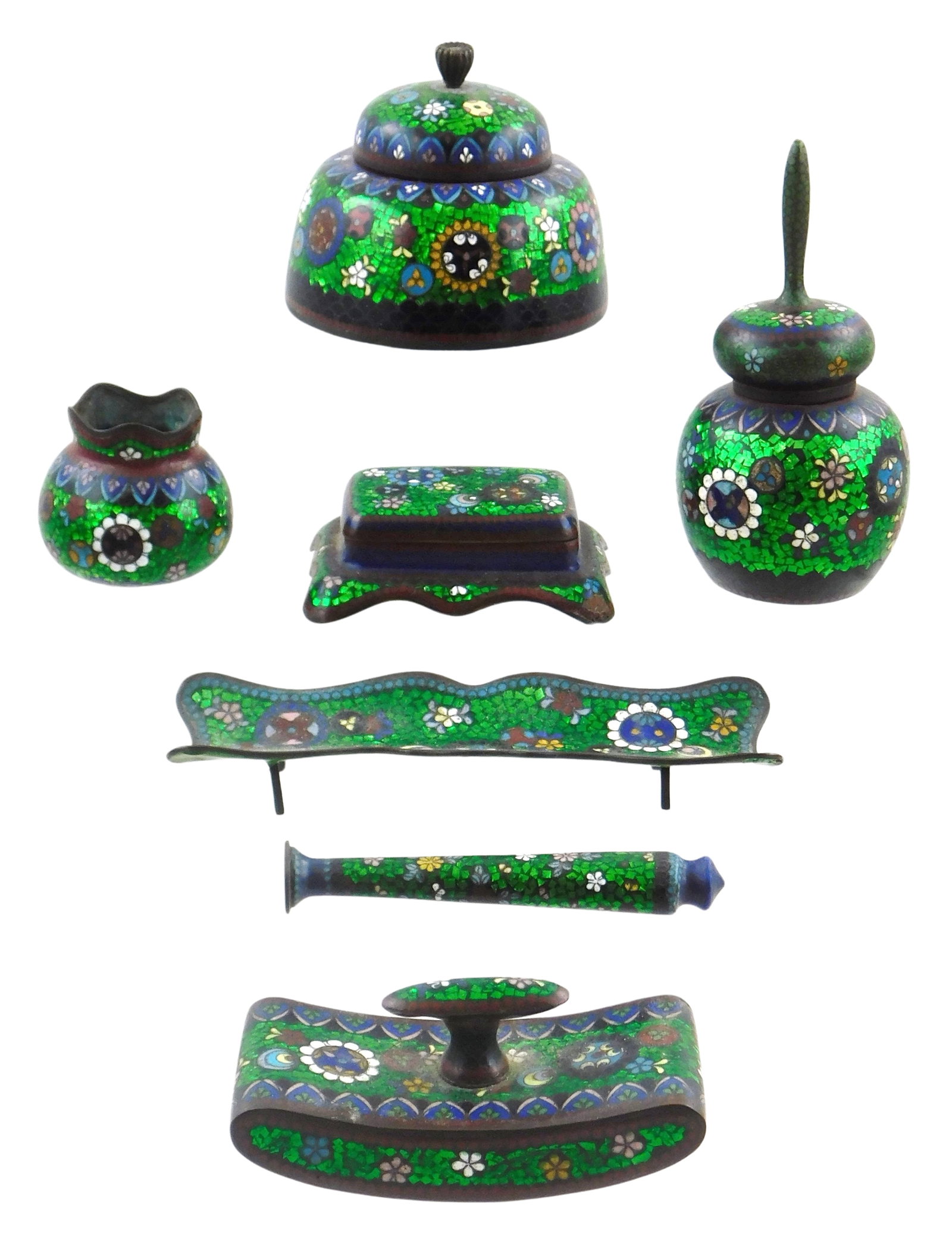 Green cloisonne desk set, late 19th/early 20th C., seven pieces, each with floral decoration on: Green cloisonne desk set, late 19th/early 20th C., seven pieces, each with floral decoration on bright green, includes an inkwell, pen tray, blotter, stamp box, wax stamp, writing brush, and waste bow