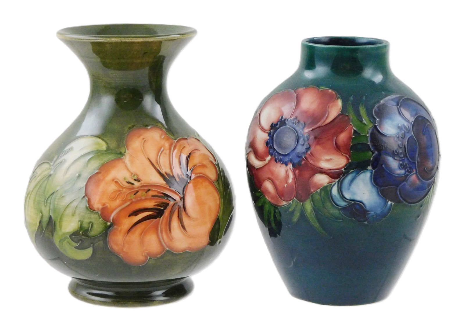 Two Moorecroft glazed pottery vases, 20th C., each signed on base, details include: taller (1 of 3)