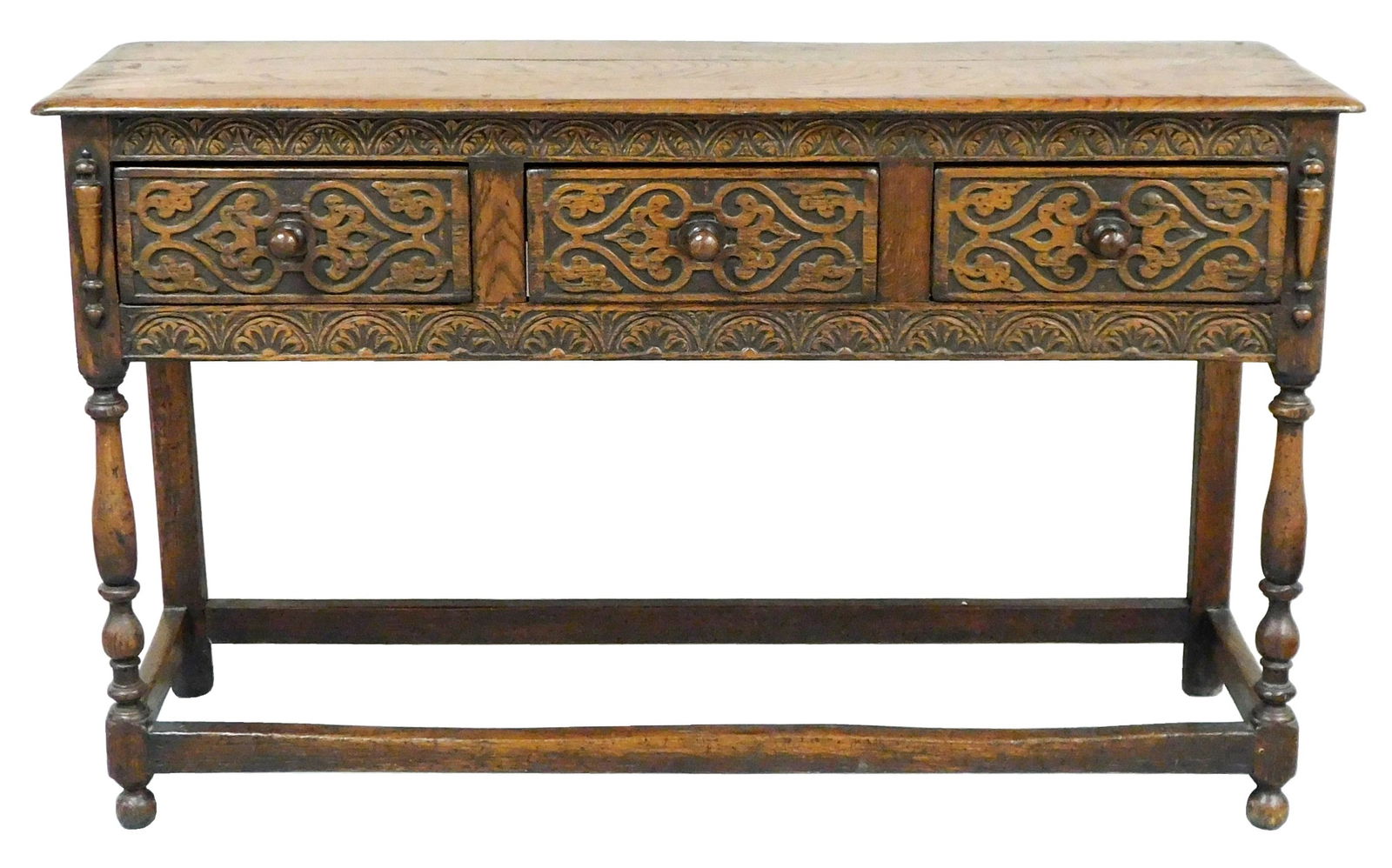 Three drawer Pilgrim style server, 19th C. in 17th C. style, oak, thumbnail molded top over carved (1 of 2)
