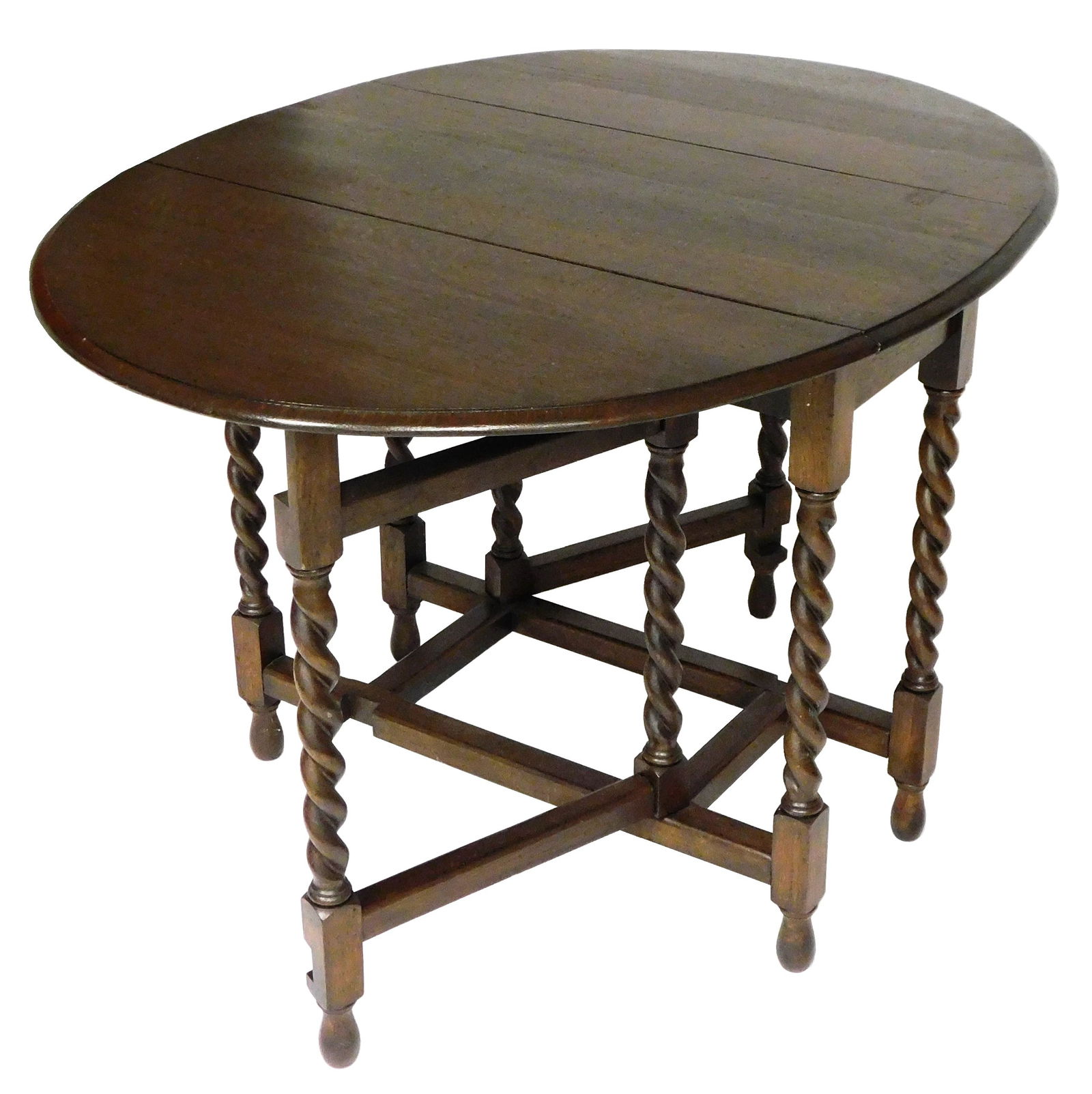 Gate-leg dining table, 18th C. form, dark stained oak, 15 1/2" w. drop leaves, top is oval when (1 of 2)