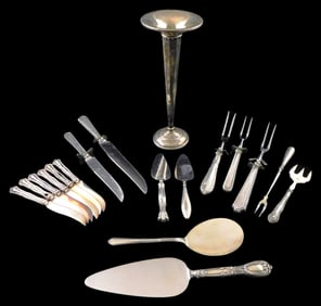 STERLING: Eighteen pieces of marked sterling weighed flatware, servingware, and holloware,