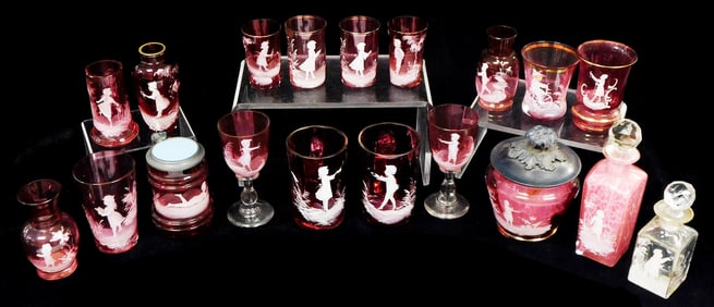 GLASS: Nineteen pieces of Mary Gregory type glassware, most cranberry, Victorian, details include:
