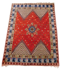RUG: Modern Turkish carpet, 9' 5" x 6' 8", wool on wool, red field, light blue primary border,