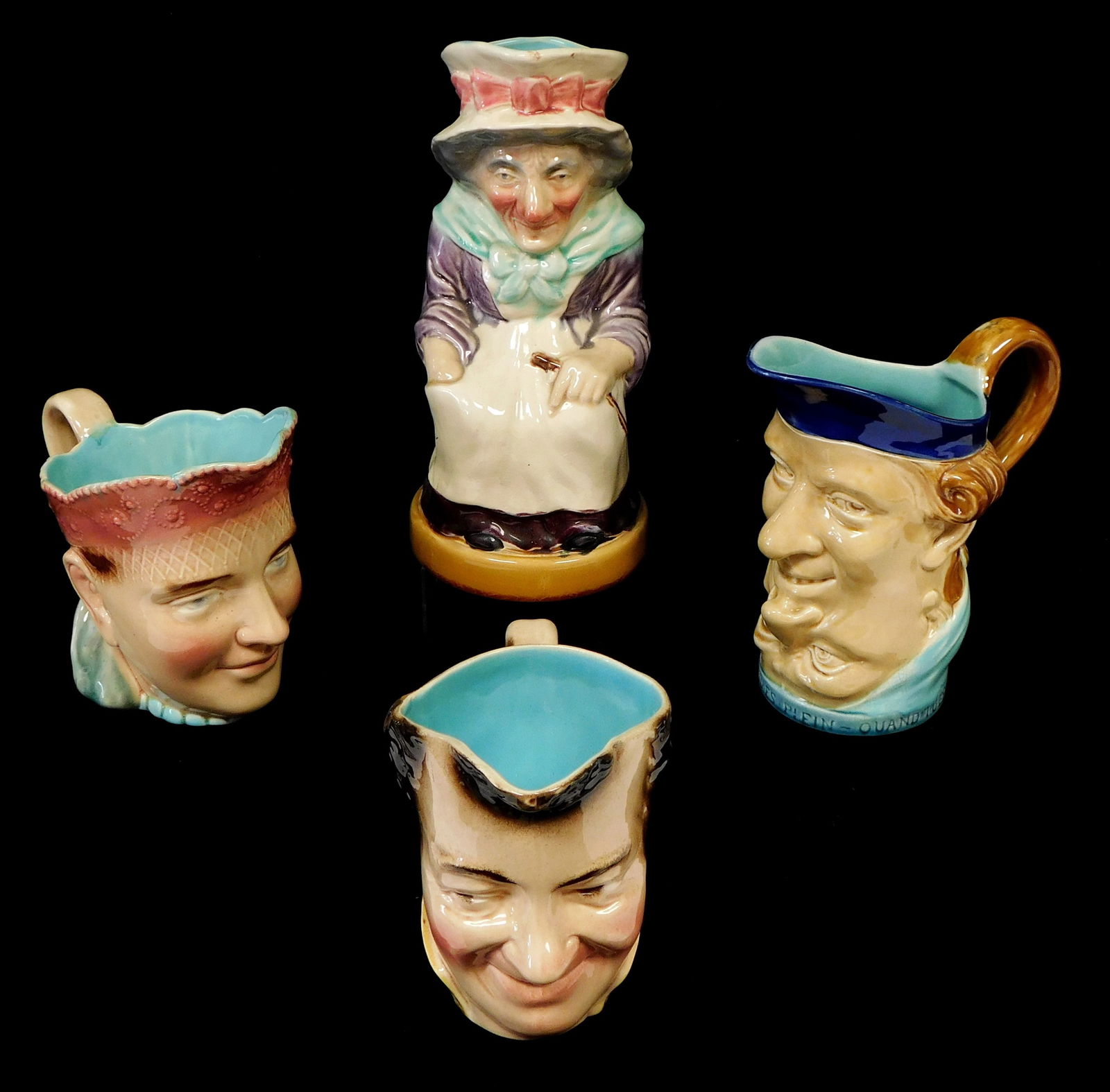 Sarreguemines majolica character jugs, French, late 19th/ early 20th C., four pieces, including: (1 of 5)