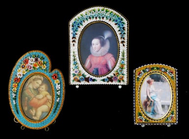 Three micro mosaic frames, all on brass stands with oval photo openings, the first a white arched