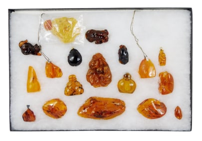 Amber, or amber type assortment, twenty pieces, include ten natural form palm stones, two small
