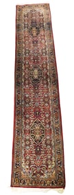 RUG: Modern Indo Persian runner, 2' 4" x 11', wool on cotton, red field, navy primary border, accent