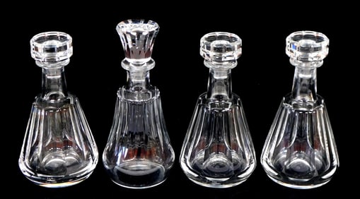 GLASS: Four Baccarat cut crystal decanters, 20th C., three matching "Tallyrand" cordial decanters