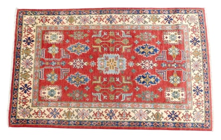 RUG: Uzbek Shirvan, 3' 10" x 6' 1", wool on cotton, center medallion on red ground, major border in