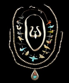 JEWELRY: Five pieces including three silver necklaces; one with attached pendant in coral and