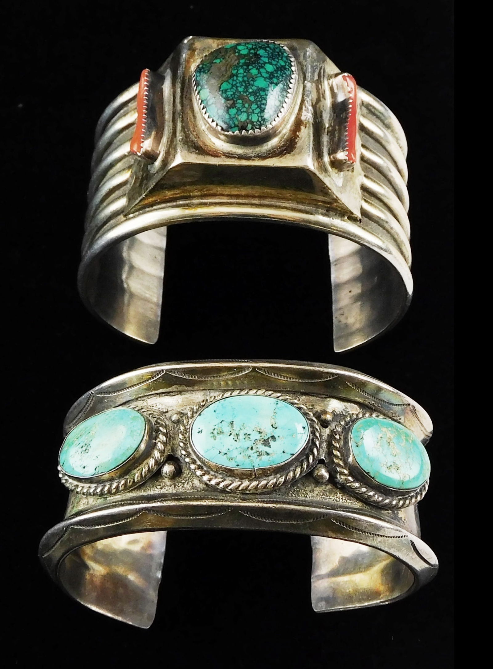 JEWELRY: Two Southwest bracelets, the first, Navajo Silver, ribbed cuff bracelet with central focal (1 of 3)