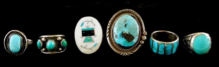 JEWELRY: Six southwest rings, tested silver, all with turquoise type stones, two with Zuni style