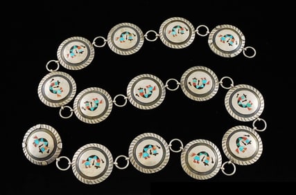JEWELRY: Zuni silver 'Ghan Kachina Dancer' belt, comprised of fourteen silver medallions each with a