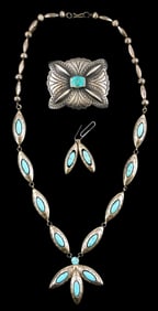 JEWELRY: Milton Burnside Navaho pendent necklace and earrings, along with similar belt buckle, all