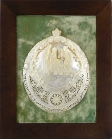 Mother-of-Pearl carved shell plaque, 20th C., elaborately carved full shell with central vignette of