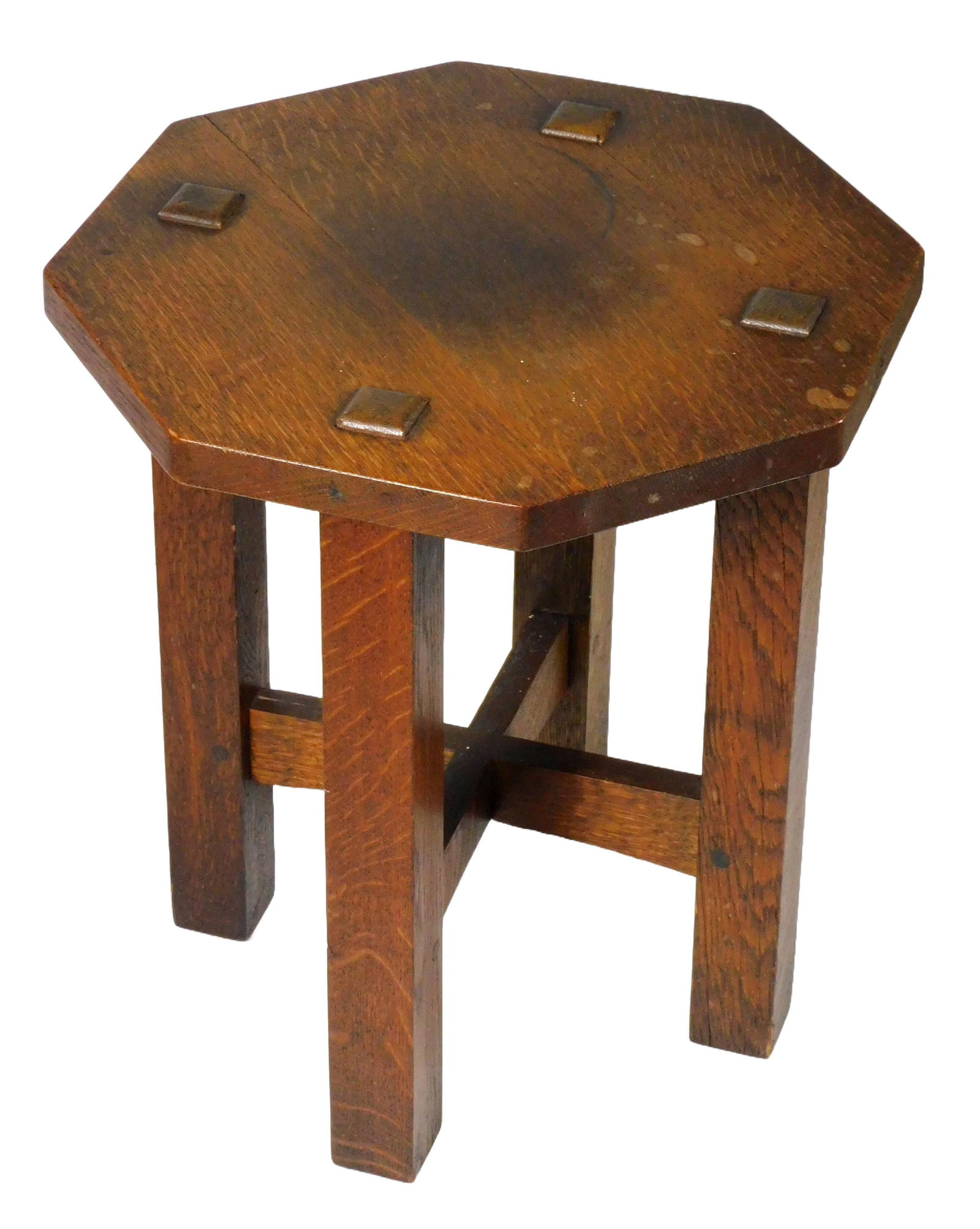 L. & J.G. Stickley tabouret table, model #558, octagon top, 1906 - 1912, oak, original red decal on: L. & J.G. Stickley tabouret table, model #558, octagon top, 1906 - 1912, oak, original red decal on leg beneath top reads "L.&J.G. Stickley, Handcraft", arched stretcher, original finish, light wear c