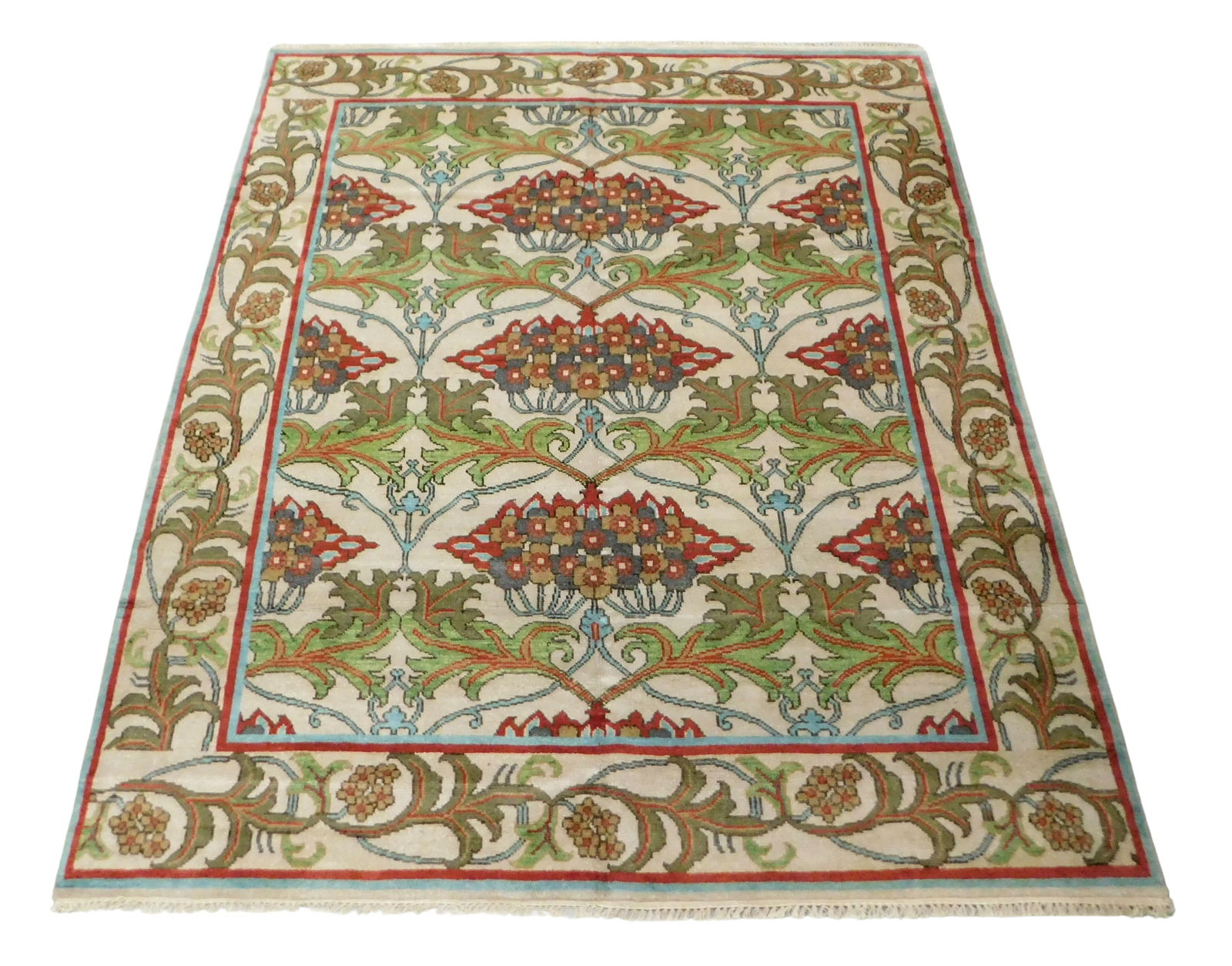 RUG: William Morris Arts and Crafts style carpet, 8' x 9' 9", wool on cotton, lime green, steel: RUG: William Morris Arts and Crafts style carpet, 8' x 9' 9", wool on cotton, lime green, steel grey, tan and olive floral and foliate decorative accents on beige ground, beige major border with cranb