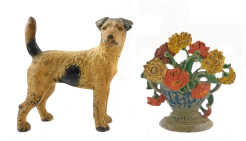 Hubley cast iron doorstops, two pieces: Zinnia floral basket, stamped '267' on reverse, older paint