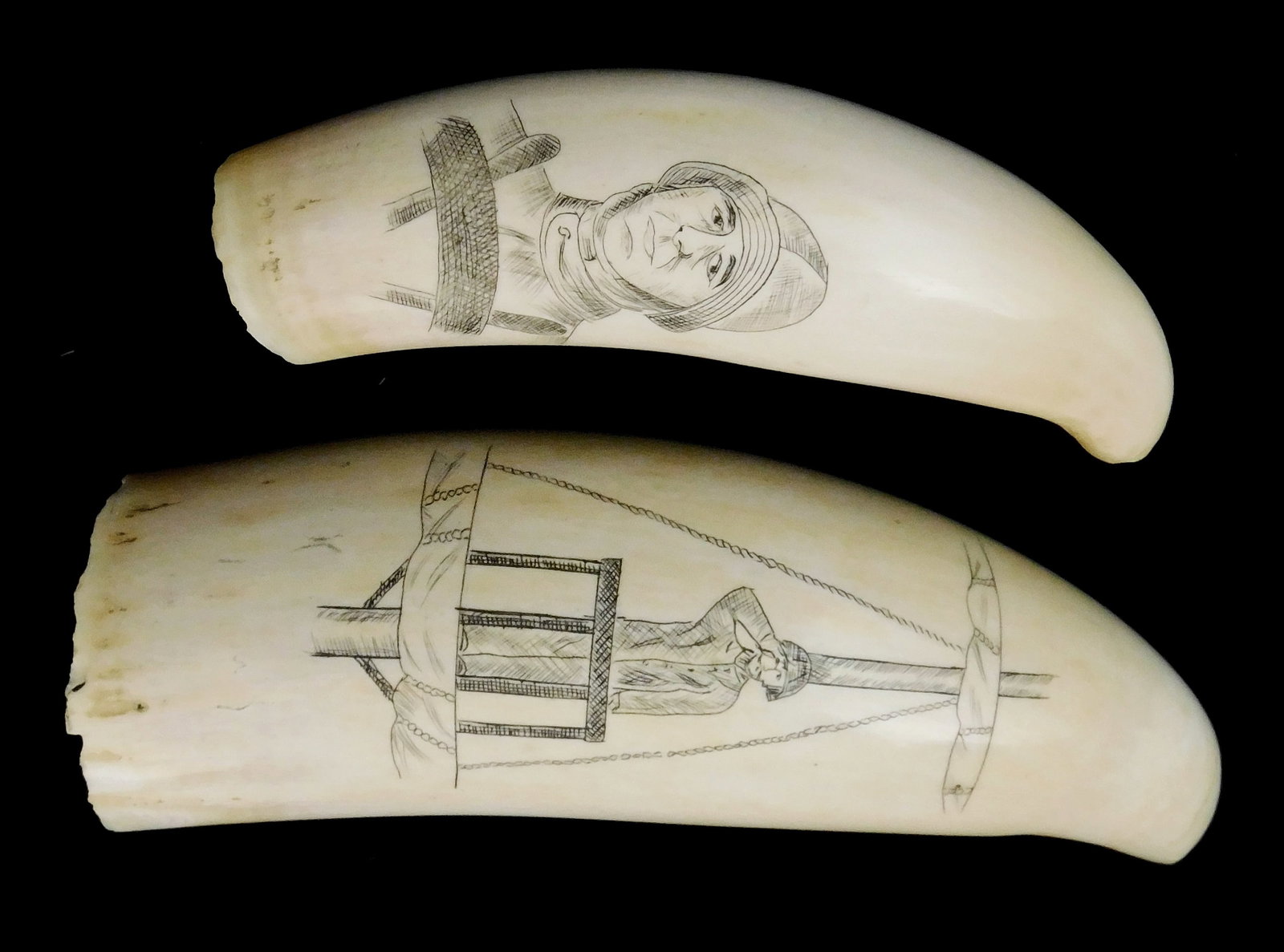 SCRIMSHAW: Two engraved whale teeth: larger depicting sailor in crow's nest, no decoration on: SCRIMSHAW: Two engraved whale teeth: larger depicting sailor in crow's nest, no decoration on reverse, unsigned, age crack on reverse, 4 1/2" l.; smaller depicts seaman at the wheel, 3 7/8" l., both u