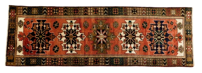 RUG: Semi-antique Caucasian runner, 3' 6" x 10' 8", wool on cotton, five geometric medallions on a