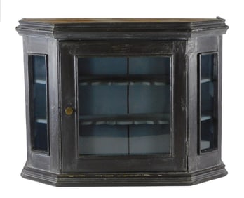 Wall cabinet, possibly American, 18th C., trapezoid shape, painted finish, complex top molding over