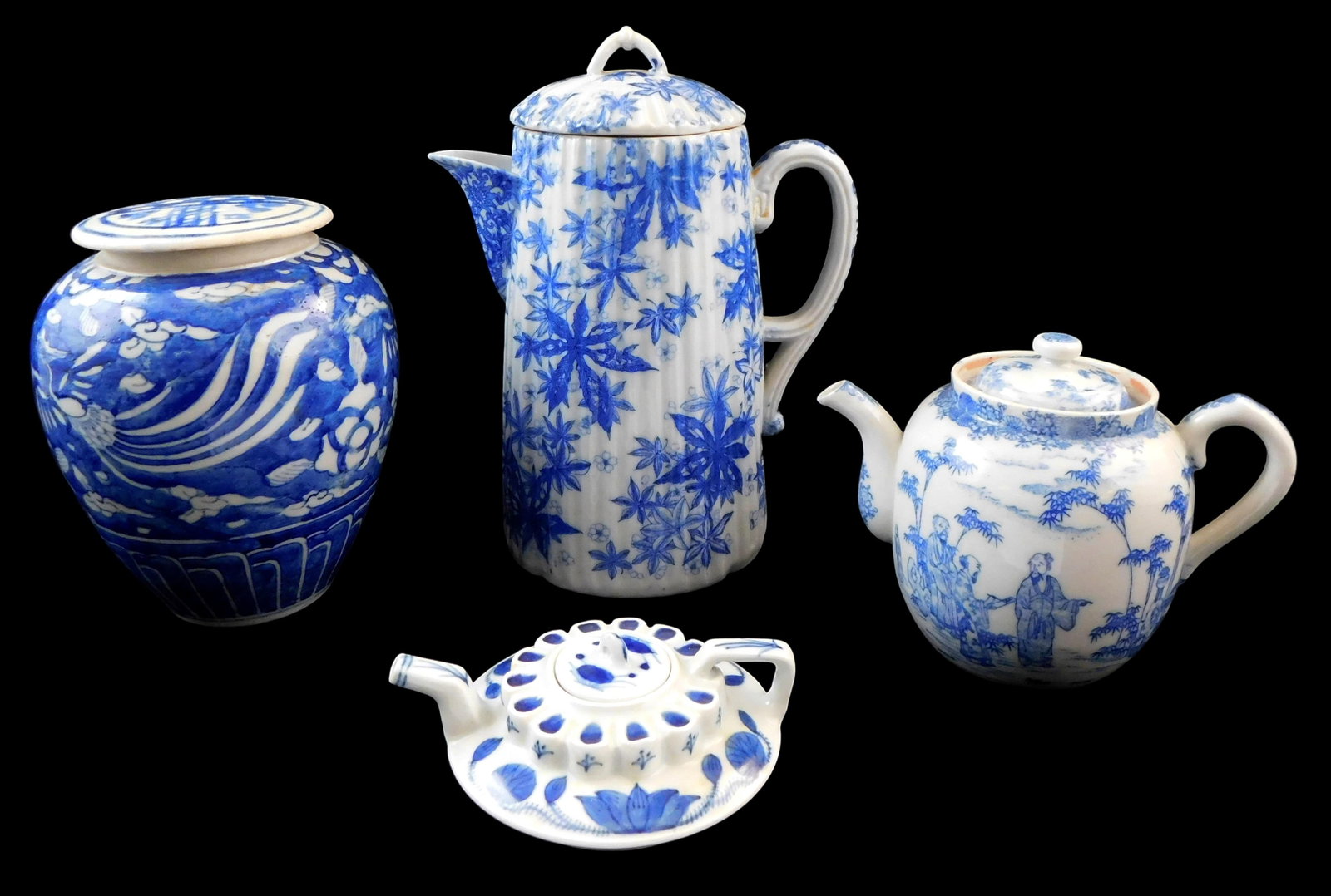 ASIAN: Asian blue and white porcelain, 20th C., including a Chinese jar decorated with phoenix,: ASIAN: Asian blue and white porcelain, 20th C., including a Chinese jar decorated with phoenix, mismatched lid; wine/teapot decorated with lotus and bearing a spurious Yongzheng reign mark on base; tr